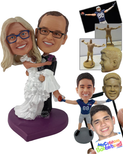 Guy Holding His Wife in His Hands with Both of Them Dressed Perfectly Personalized Bobblehead